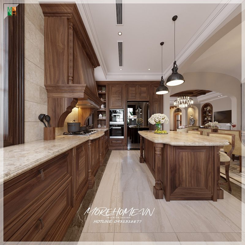Thiết kế phòng bếp có đảo bếp phong cách tân cổ điển với đường nét chạm khắc uyển chuyển tỉ mỉ mang tới tính thẩm mỹ cao không gian sang trọng đẳng cấp.